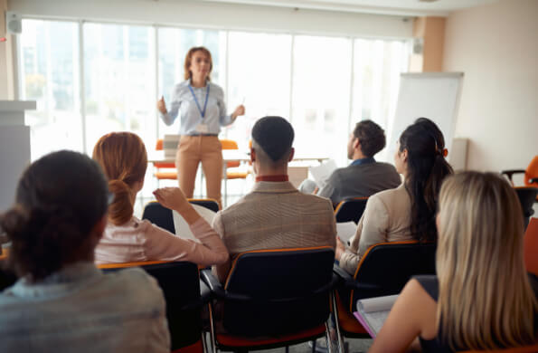 A business tea watching someone present