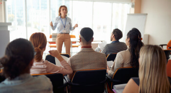 a speaker giving a business presentation